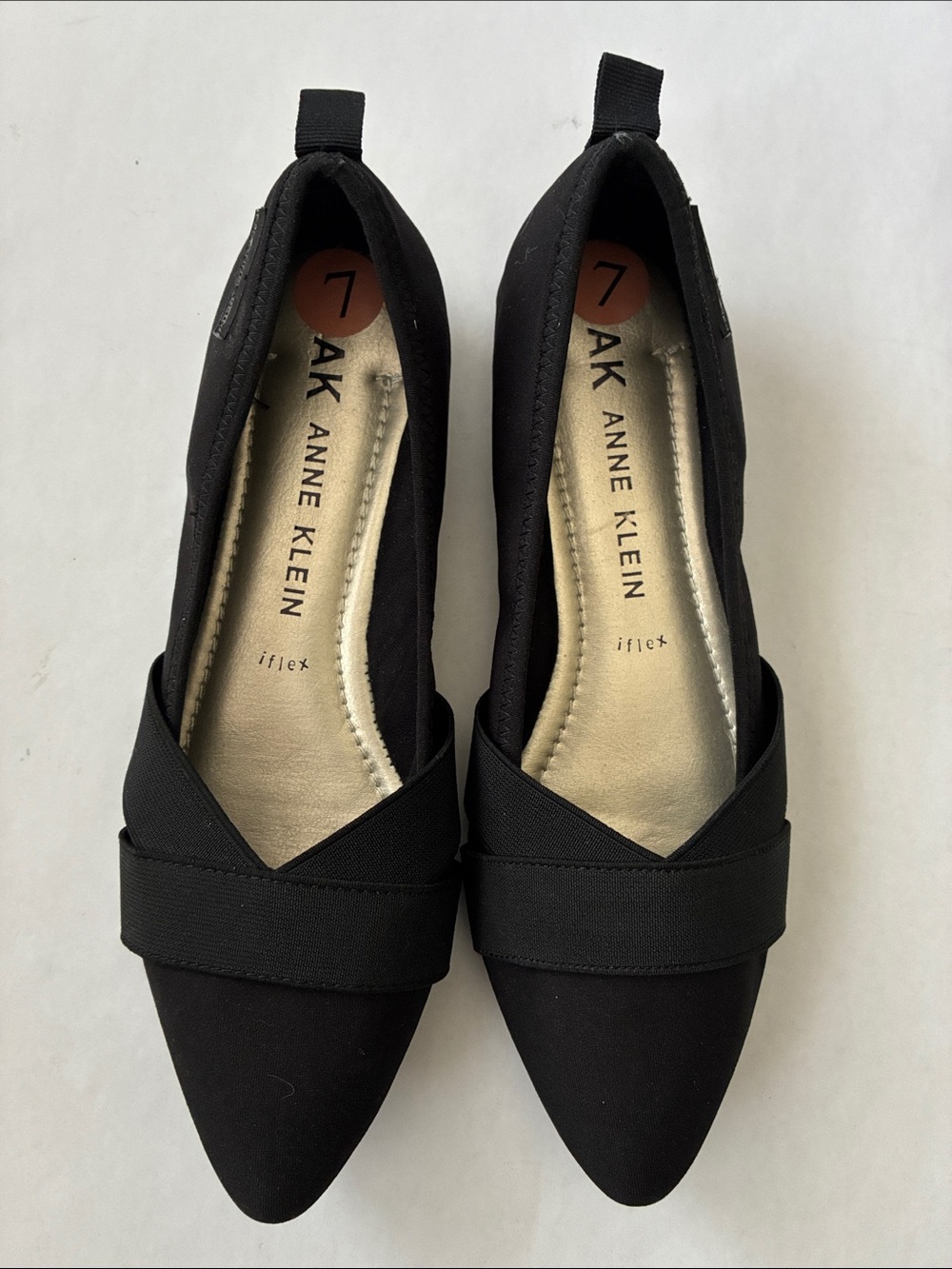 Anne Klein Black Pointed-Toe Slip-On Flats with Crossover Strap
